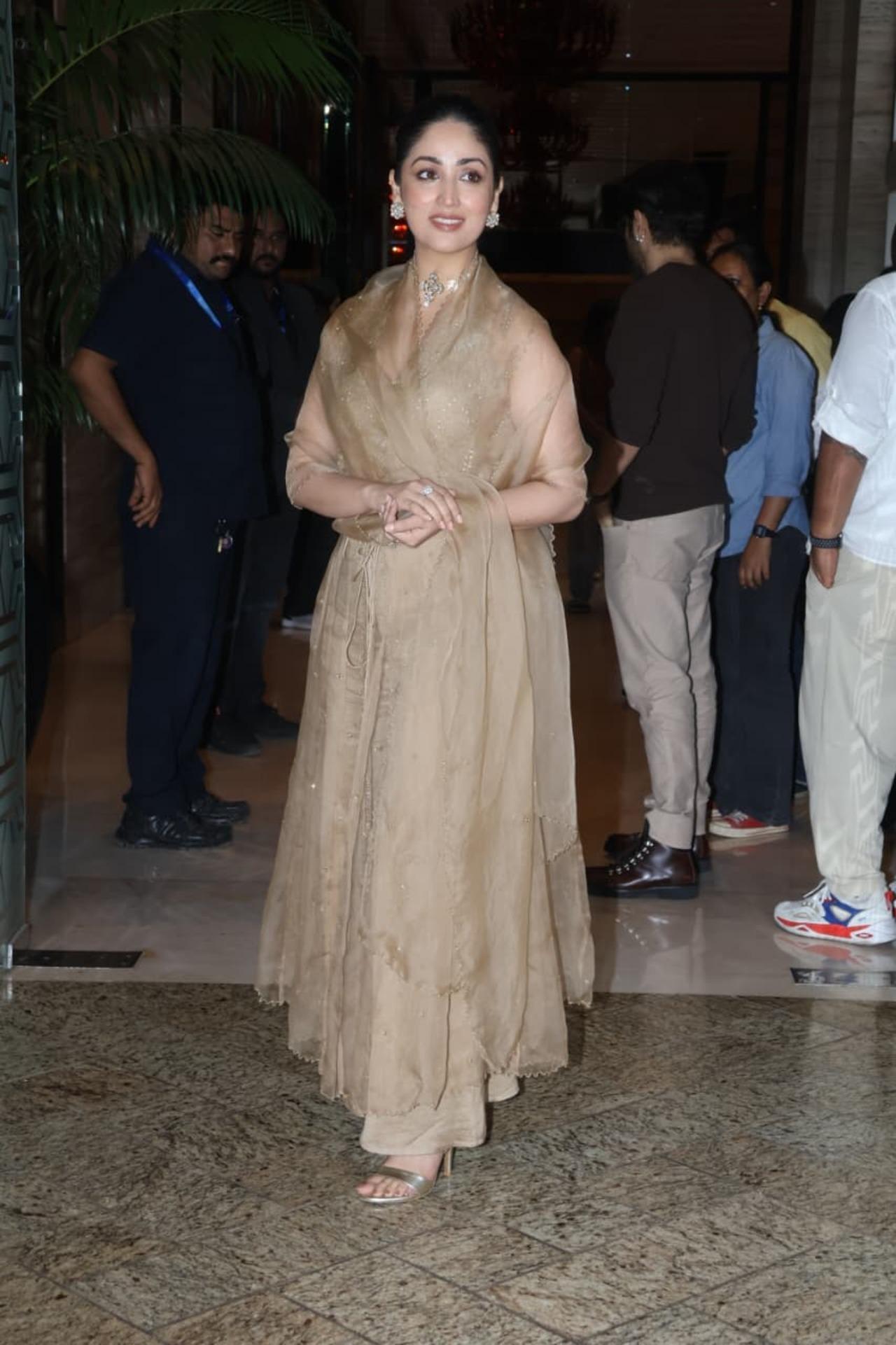 Yami Gautam stepped out to promote HAQ  and looked graceful in a beige embellished anarkali paired with a matching dupatta and delicate jewellery, keeping her look elegant